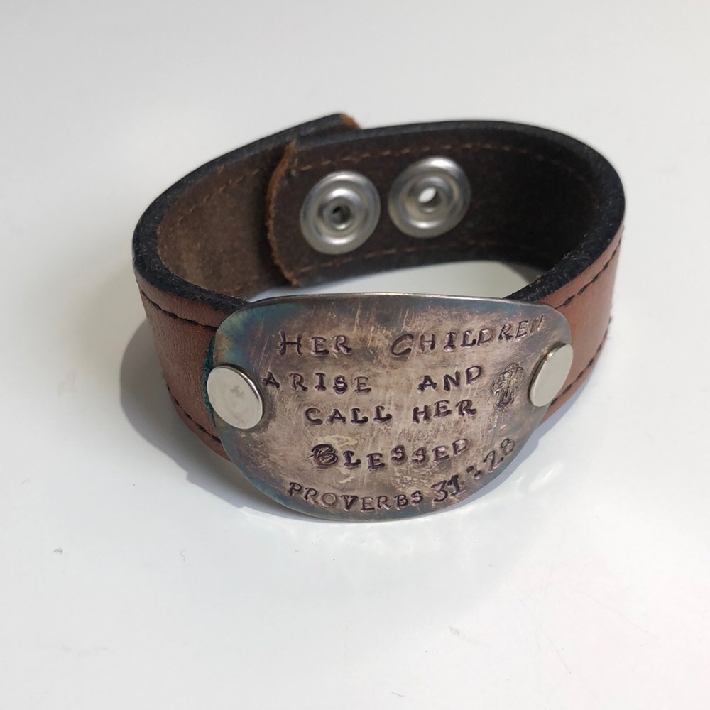 Leather bracelet.